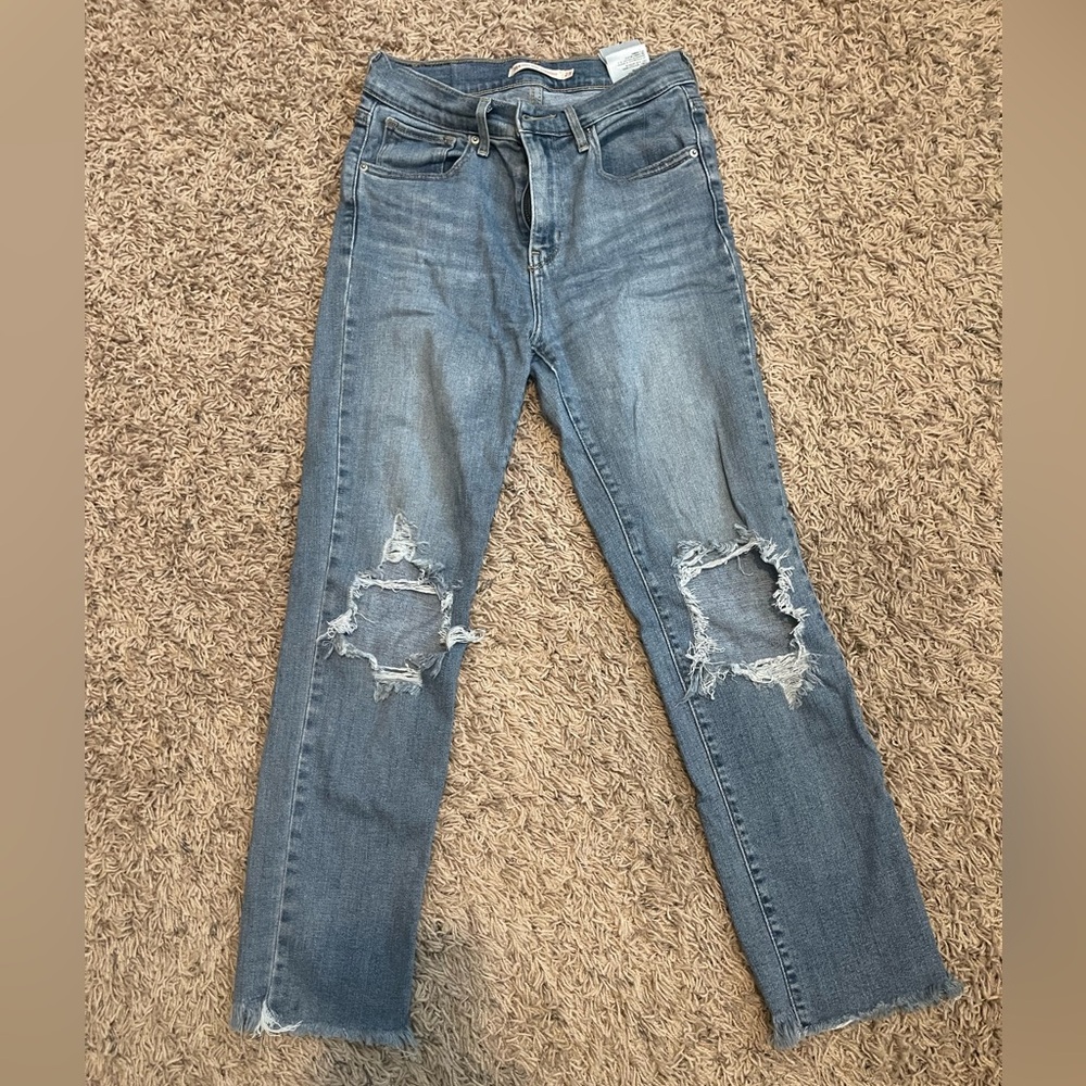 Levi high rise 724 distressed straight leg jeans